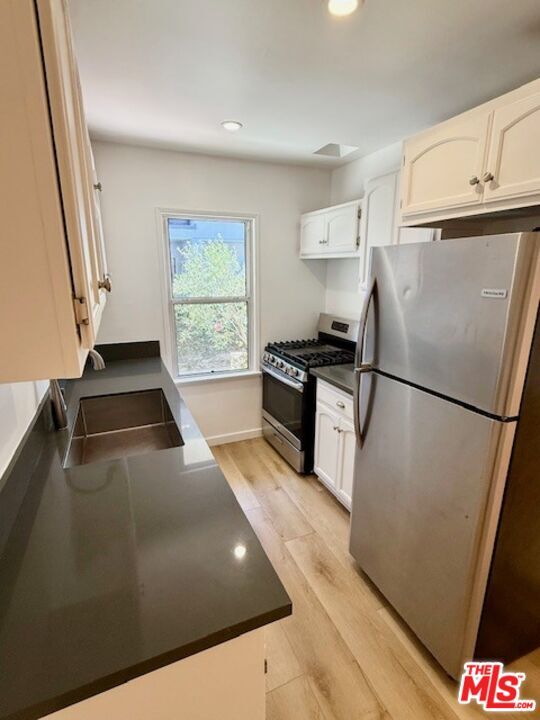 Building Photo - 1143 N Formosa Ave