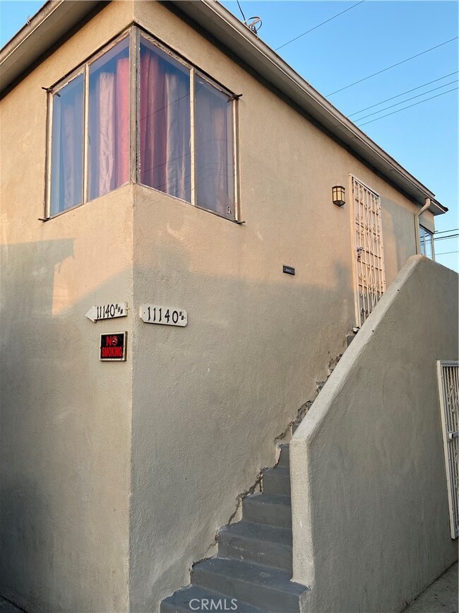 Primary Photo - 11140 1/2 South Mariposa Ave-