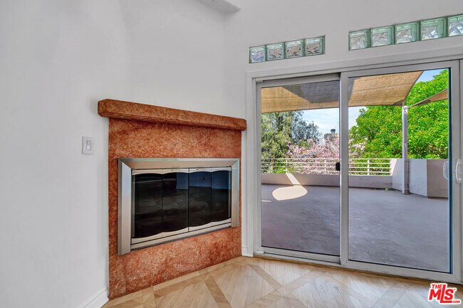 Building Photo - 4477 Woodman Ave