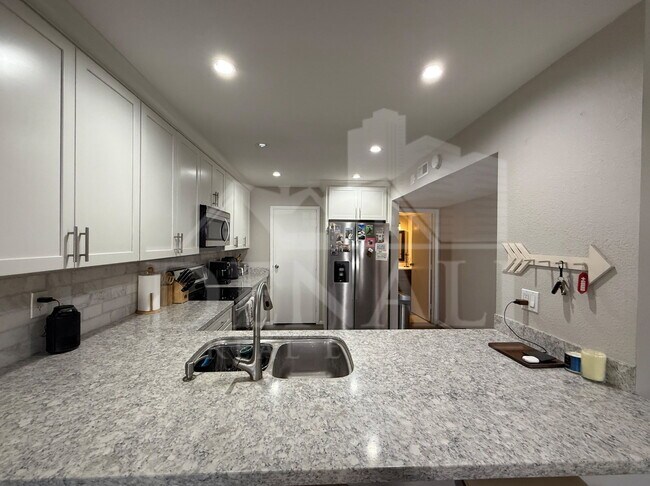 Building Photo - 7920 E Arlington Rd