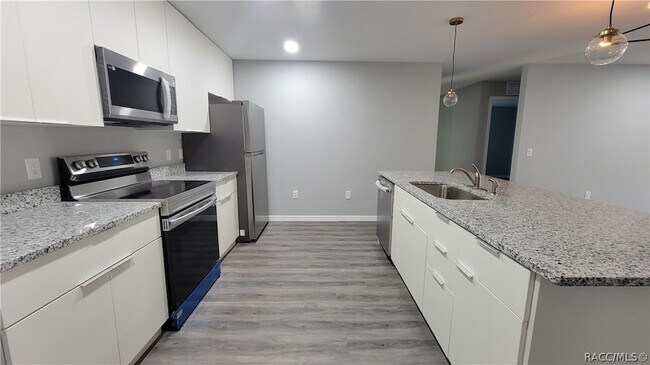 Building Photo - 7043 N Outrigger Terrace