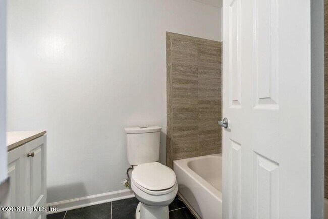 Building Photo - 8066 Le Havre Dr N