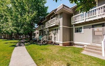 Building Photo - Spacious, three level, 4 Bed 2.5 bath Townhome in Ammon right behind the Walmart on Hitt.