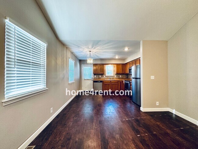 Building Photo - Updated Kitchen, Composite Deck and Refrig...