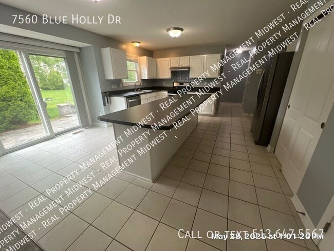 Building Photo - 7560 Blue Holly Dr