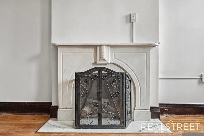 Building Photo - Timelessly Renovated Historic Triplex with...