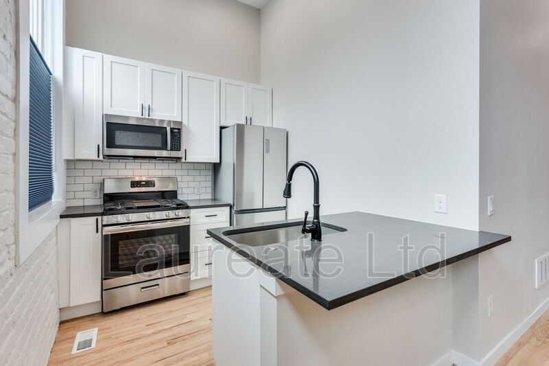 Building Photo - 1234 E Colfax Ave