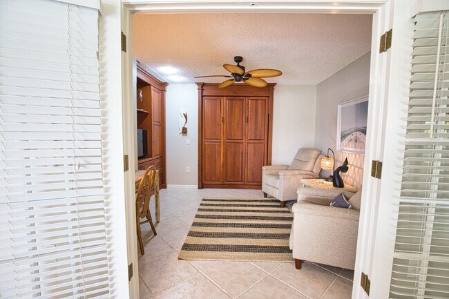 Building Photo - Seasonal Short-Term 2 Bed 2 Bath Heated Pool Villa with a Den in Harrington Lakes at Planation Go...