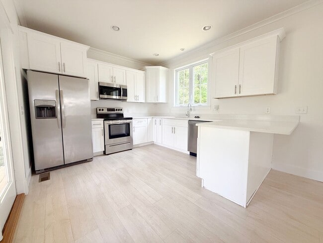 Building Photo - Pet-Friendly 3-Bedroom Home with Modern Features, Covered Deck & Bright Open Space