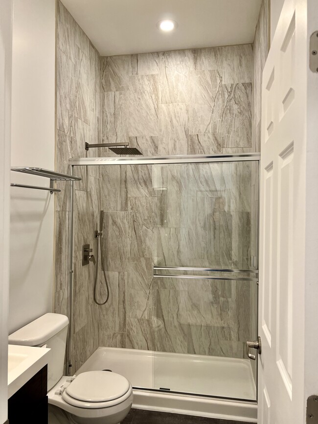 custom shower - 110 W 3rd St