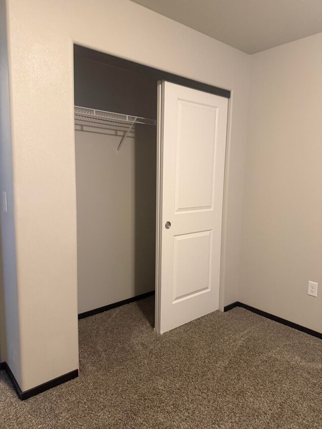 Building Photo - Lots of storage space in this 4- Car garage for all your playthings!!