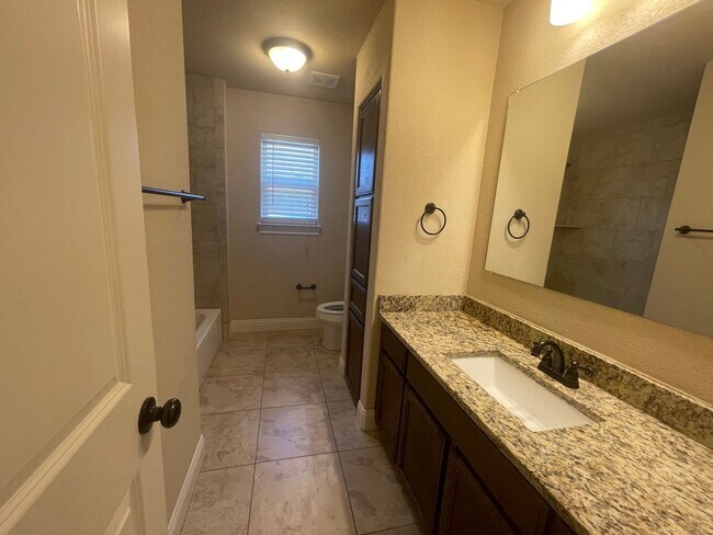 Building Photo - Beautiful Benbrook 3B/2.5B Townhome ((Stainless Steel Appliance Package)) Dazzling wood-like tile...
