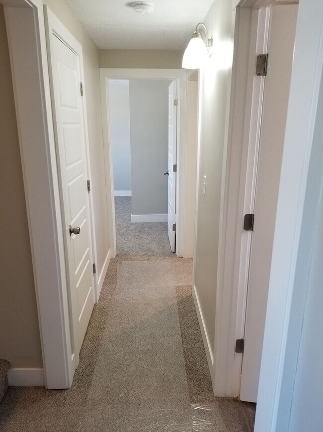 Building Photo - Spacious 5-Bedroom Magna Home with Deck and Ample Parking