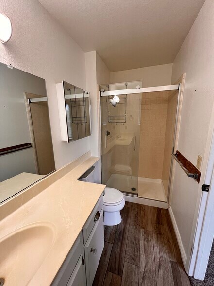 Primary bathroom step-in shower - 9012 Cornwall Dr