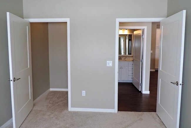 Building Photo - LUXURY CONDO - AVAILABLE NOW - MOVE IN PROMO