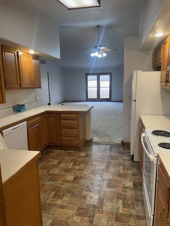 Building Photo - Spacious 3 Bed 3 Bath Townhome with Finished Basement & 2-Car Garage