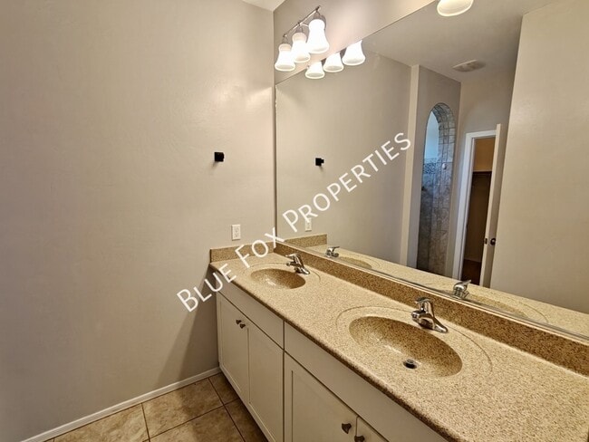 Building Photo - 34185 S Presidio Pl