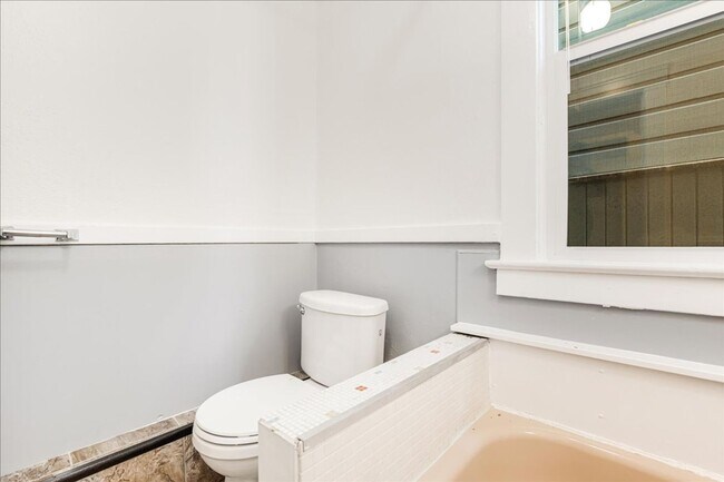 Building Photo - Spacious, Charming Victorian Style Tri-Ple...