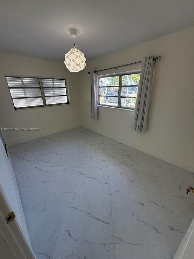 Building Photo - Northwest 58th Place, Hialeah, FL 33012 - 4 BR 3 BA single-family home