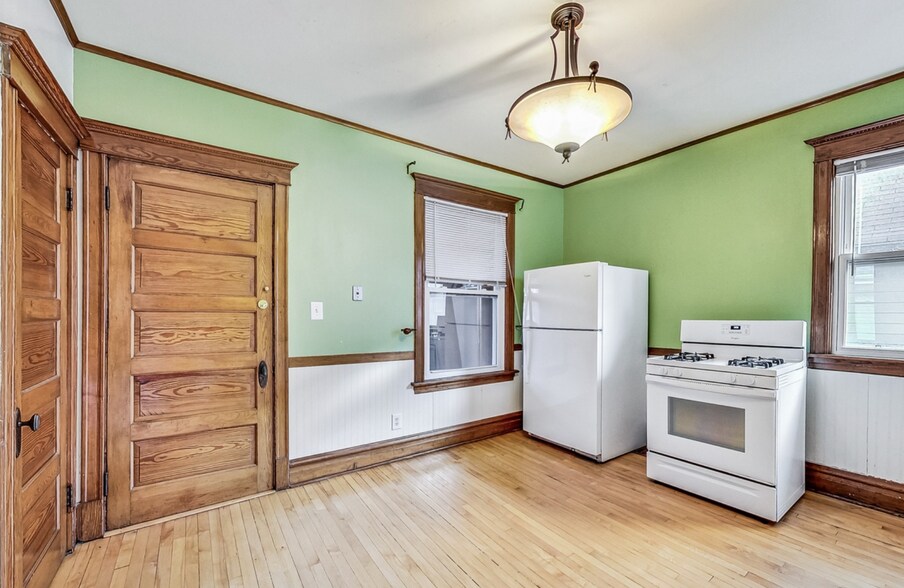 Kitchen includes a closet with washer and dryer - 3747 N Kostner Ave