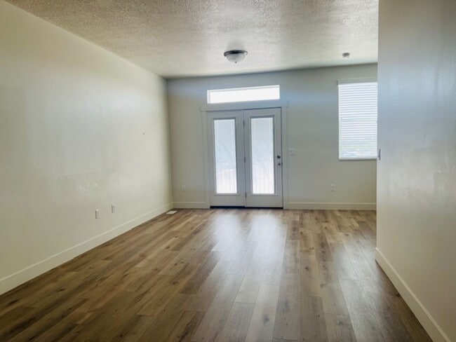 Building Photo - Beautiful townhome with garage and central...