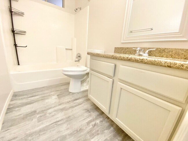 Building Photo - ADORABLE GATED CONDO LOCATED IN A GATED CO...