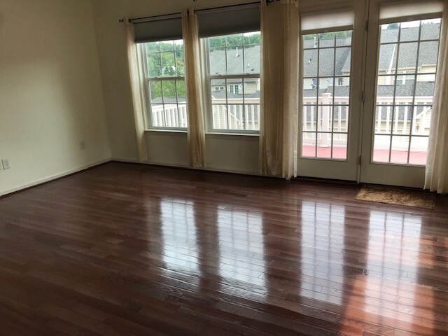 Other side of Family room, entire second floor has solid wood floors - 1944 Asheville Dr