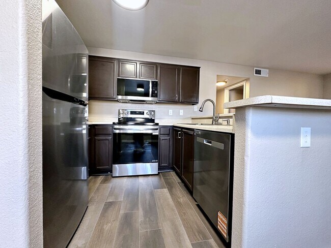 Building Photo - 1 MONTH FREE***REMODELED 2 BEDROOM DOWNSTAIRS CONDO IN GATED COMMUNITY