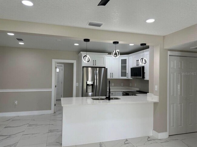 Building Photo - 5008 N Tampania Ave