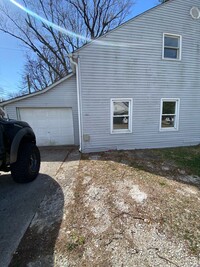 Building Photo - Very Large Duplex, includes water and sewage