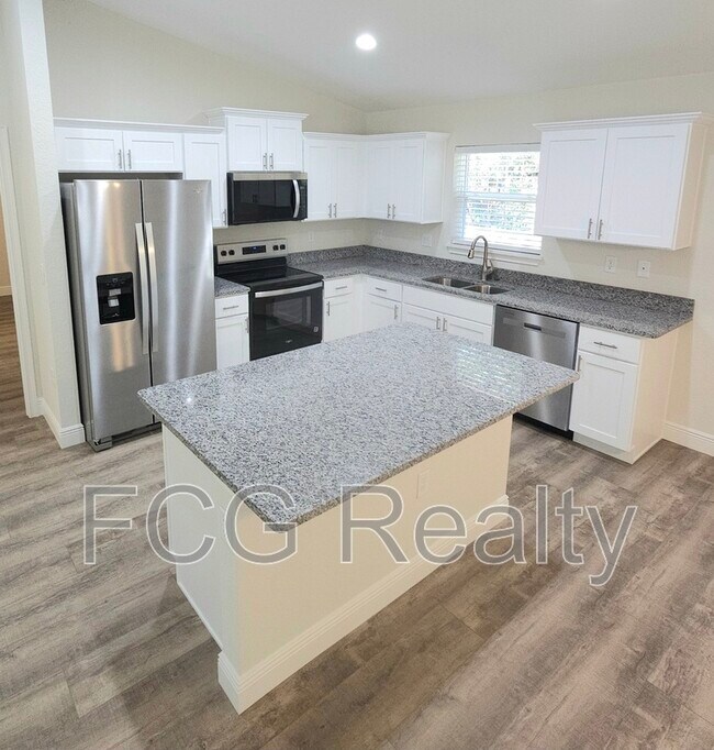 Building Photo - 10663 N Adler Dr