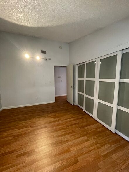 master bedroom with new closet doors - 250 Del Verde Cir