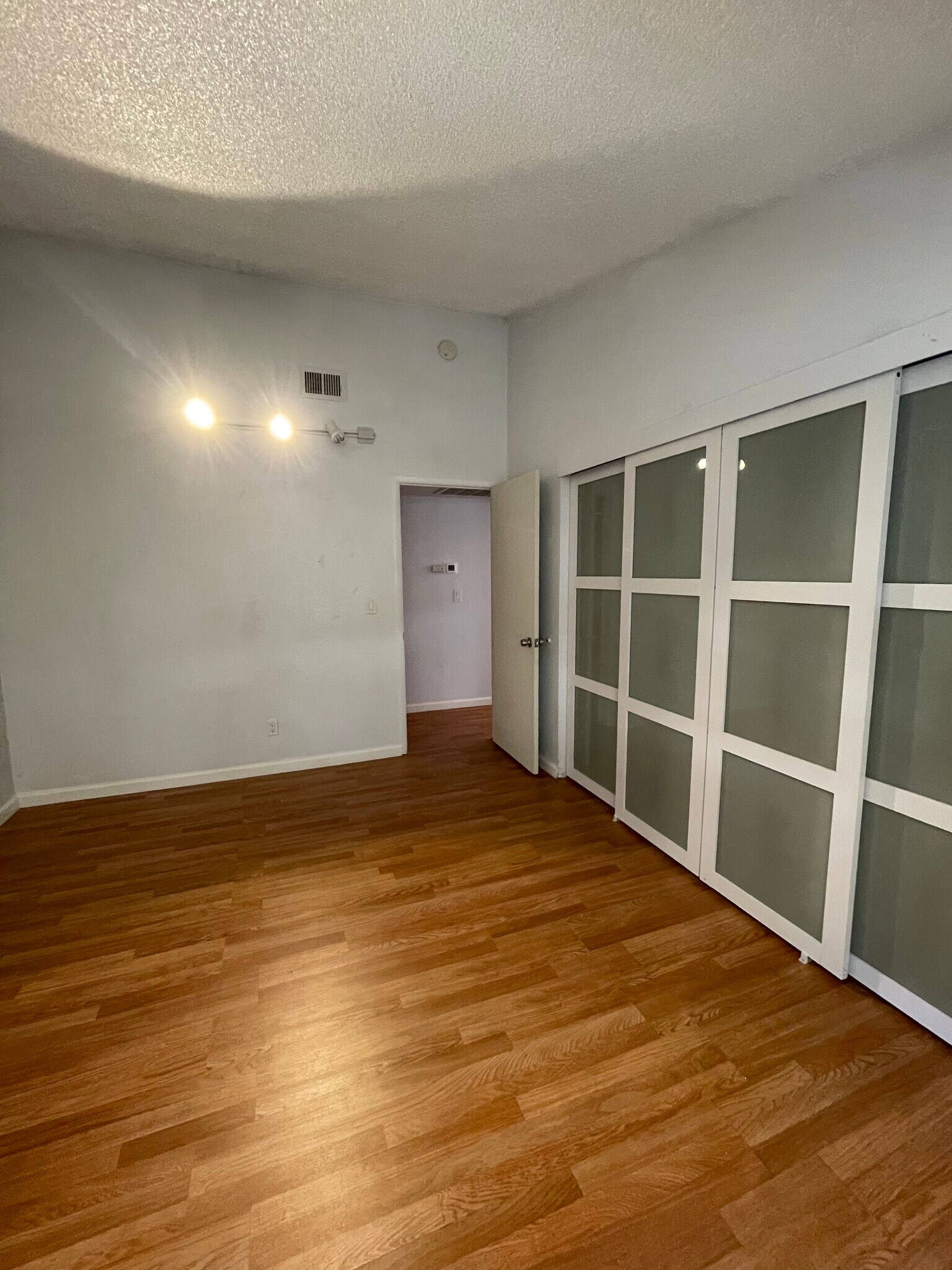 master bedroom with new closet doors - 250 Del Verde Cir