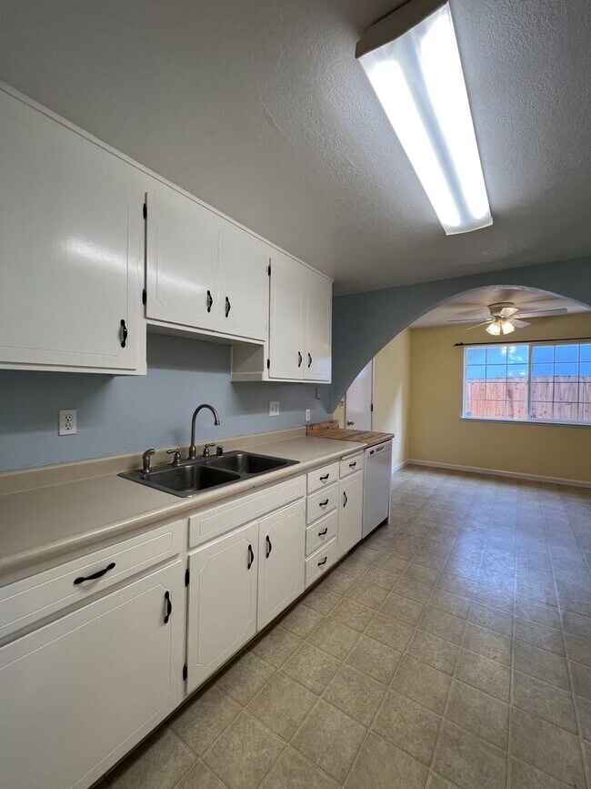 Building Photo - Spacious 1,196 Square Foot  4BR Home Across from Technology High School | Large Yard & 2-Car Garage"
