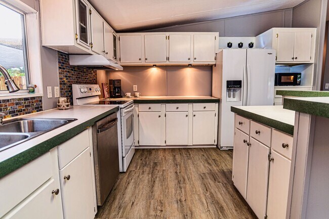 Building Photo - Home on half acre with land and storage