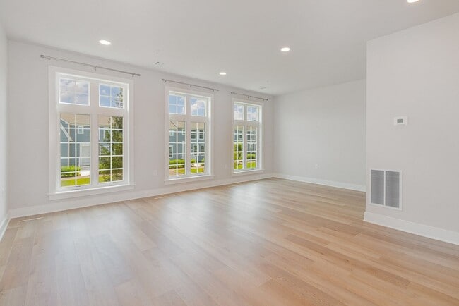 Building Photo - Modern 2025 Townhome | Open-Concept Living, Chef’s Kitchen with Large Island & 2-Car Garage