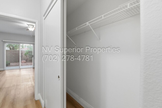 Building Photo - SW!!! 2 Bedroom Condo 1st Floor!! 2 Garage!! Gated!! Community Pool!! Fitness Room!! 2 Primary Be...