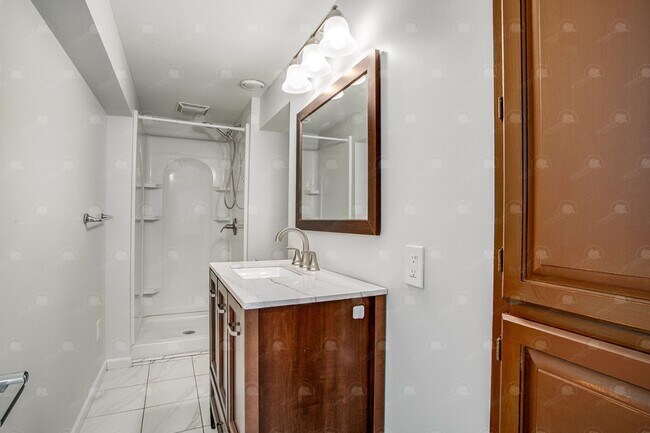 Building Photo - **Spacious 3-Bedroom Townhome with Partially Finished Basement and Off-Street Parking**