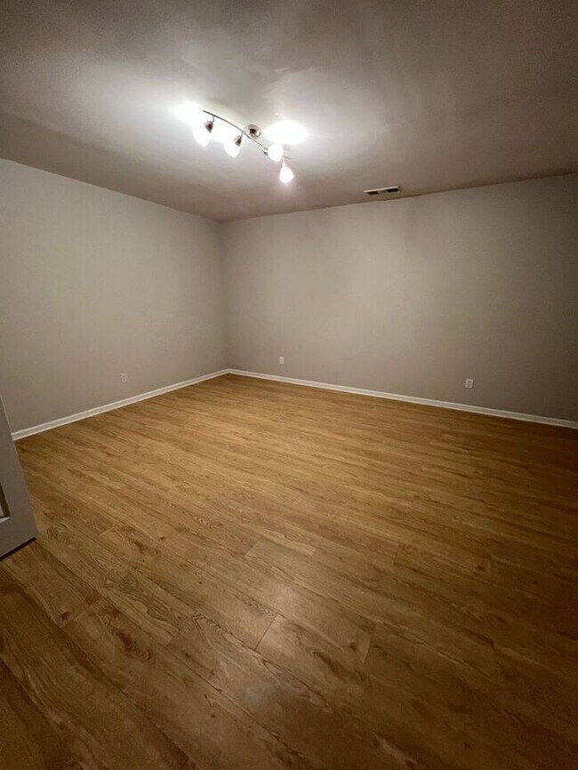 Building Photo - Spacious 2-Bedroom Townhome with Finished Studio Suite – Prime Location!