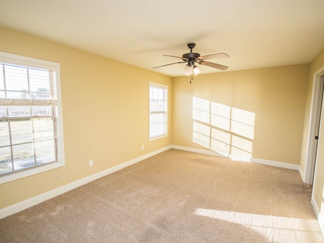 Building Photo - Minutes to Mazda Toyota and Amazon. Fenced back yard