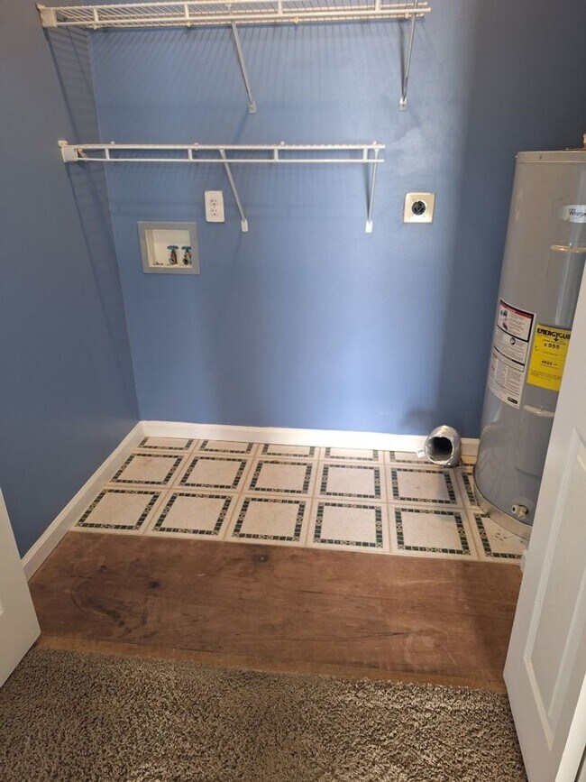 Building Photo - HOLIDAY MOVE IN SPECIAL. $500.00 OFF OF TH...