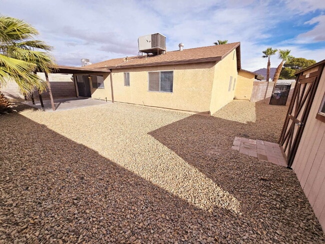 Building Photo - Spacious 4-Bedroom Oasis with Elegant Granite Touches in Vibrant Las Vegas!