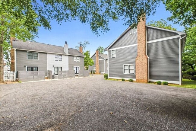 Building Photo - UNCG Area – Chancellors Court Townhomes. Walk to Campus and just minutes to Downtown!