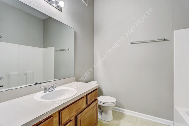 Building Photo - 6788 Manotak Oaks Dr
