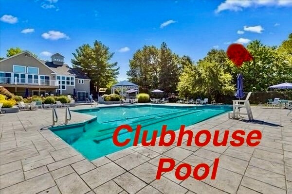Clubhouse view with lifeguard chairs. Jack/Jill bathrooms and showers in clubhouse lower level. - 11 Devon Club Ln