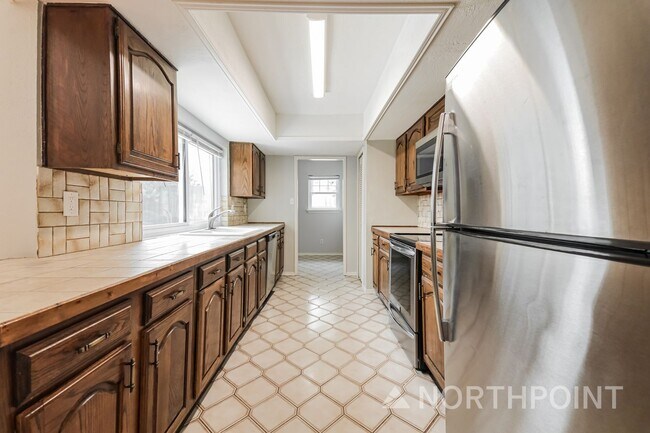 Building Photo - 4BR/2BA | Updated Single Family Home | 2-Car Garage Parking | Gated backyard