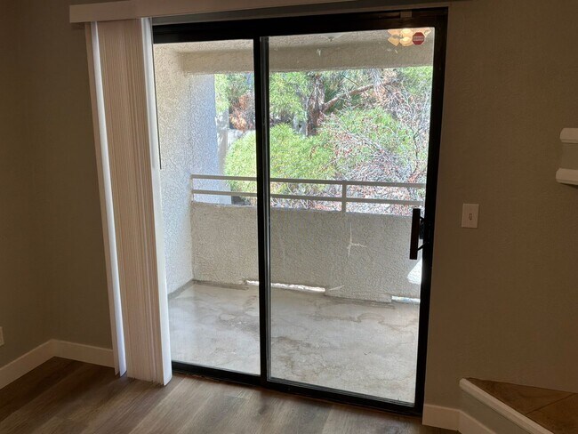 Building Photo - Condo 3 bedrooms 2 bathrooms 1 car garage gated subdivision.