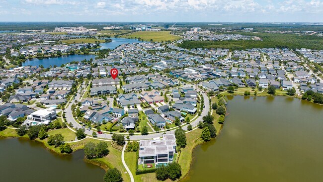 Building Photo - Move In Ready End Unit Townhome in Laureate Park | 3 Bed | Tesla Charger