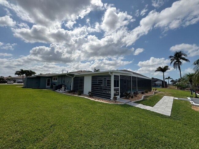 Building Photo - Beautifully Furnished Pool Home with Boat ...