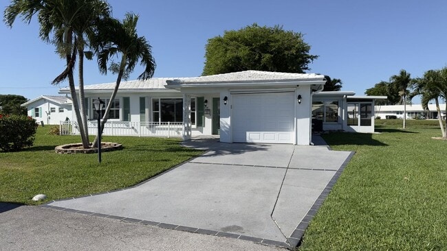 Building Photo - Lakefront 2BR Home in 55+ Leisureville Community